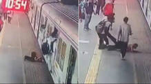 woman-police-officer-saves-young-man-from-moving-train-in-mumbai